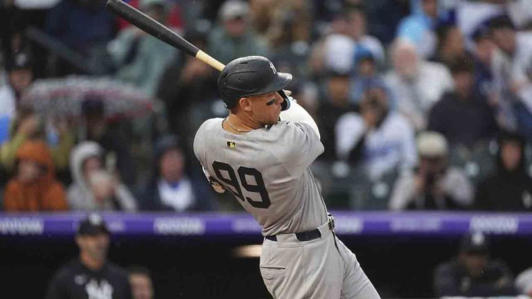 Judge helps Yankees weather Rockies, rain delay in win to take series