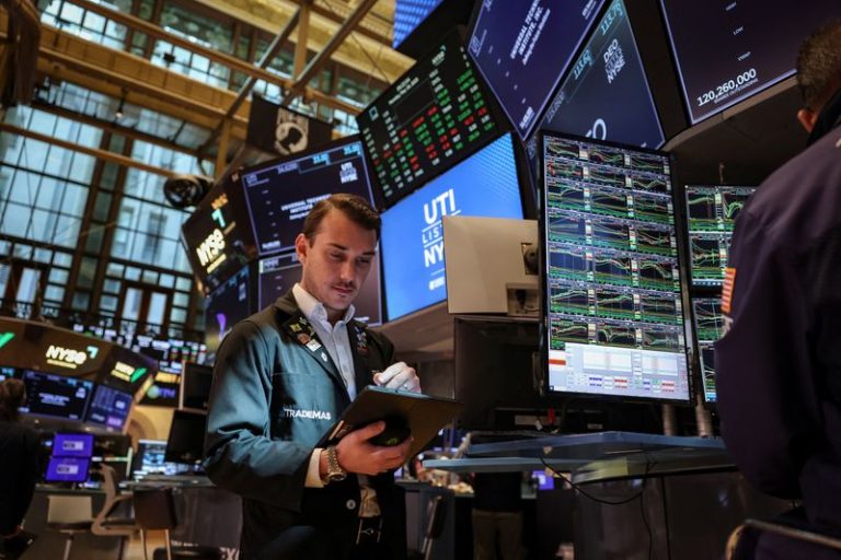 Wall Street stocks finish flat with sentiment weakened by Moody’s downgrade