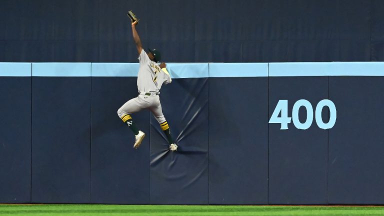Athletics’ Denzel Clarke wows friends, family, Varsho with catch