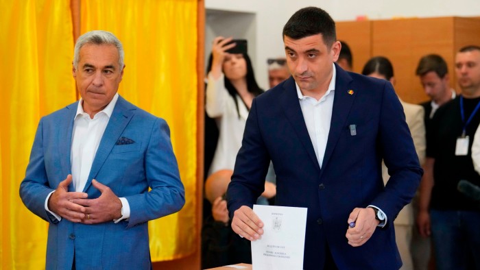 Hard-right candidate wins first round of Romania’s election rerun — exit polls