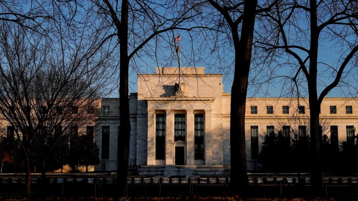 Federal Reserve holds rates steady as it warns of rising economic risks
