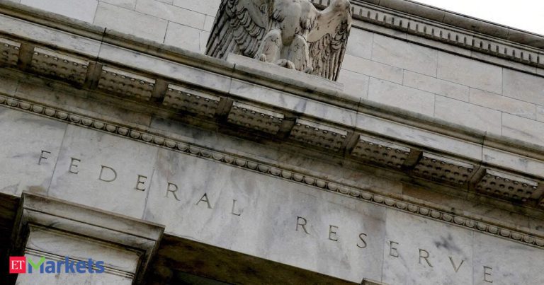 Fed says banks can withstand economic downturn, clears way for dividend hikes