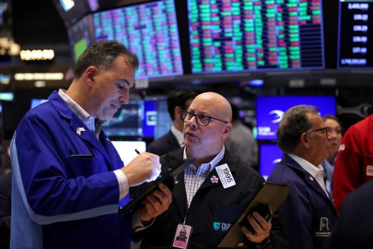 US stocks end up on jobs data, China hopes; Tesla bounces
