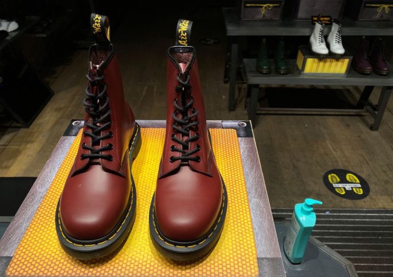 Dr Martens forecasts return to profit growth, shares jump