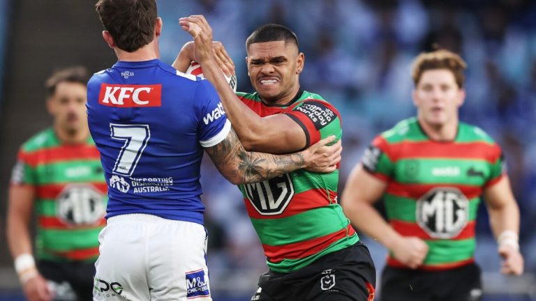 Lightning crashes momentum but Dogs hold off Souths as halves shoot-out ends in a draw