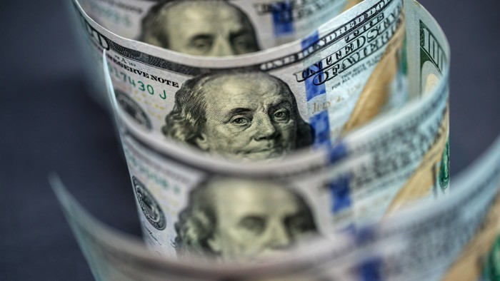 Dollar sinks to three-year low on Trump tariff threat