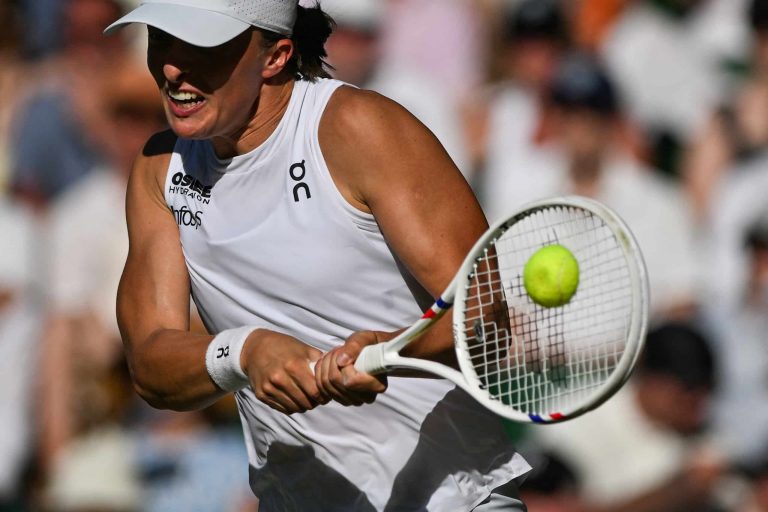Swiatek routs Bencic to reach first Wimbledon final