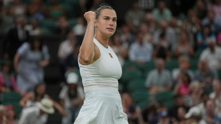 No. 1 Sabalenka holds off home favourite Raducanu to advance at Wimbledon