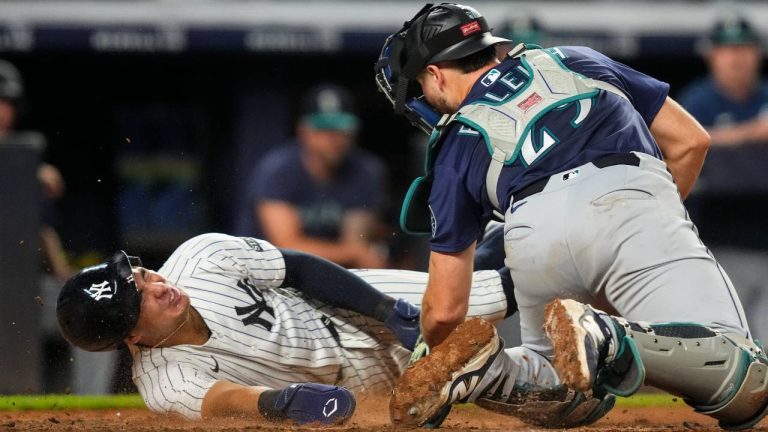Yankees rally past Mariners after going hitless against Woo until the eighth