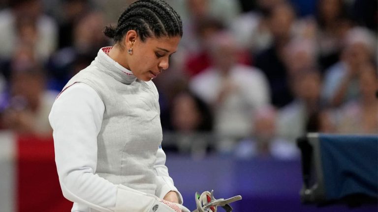 Saved by kisses: Olympian cleared in doping case