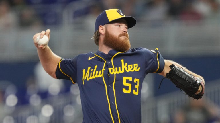 Brewers’ Woodruff stymies Marlins in spectacular return