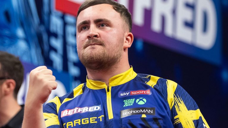 World Matchplay 2025: Luke Littler beats James Wade to win Phil Taylor Trophy and complete Triple Crown in Blackpool | Darts News